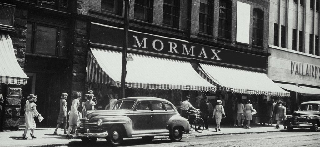 Black And White Photo Of 1940s Mormax Office On Busy New York City Street