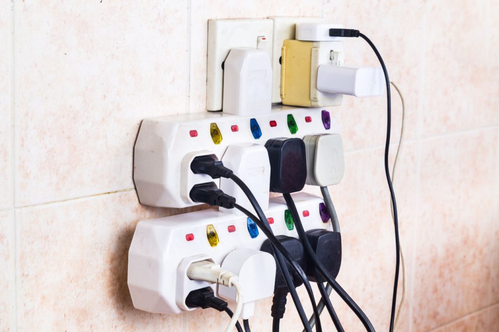 Multiple Electricity Plugs On Adapter Risk Overload