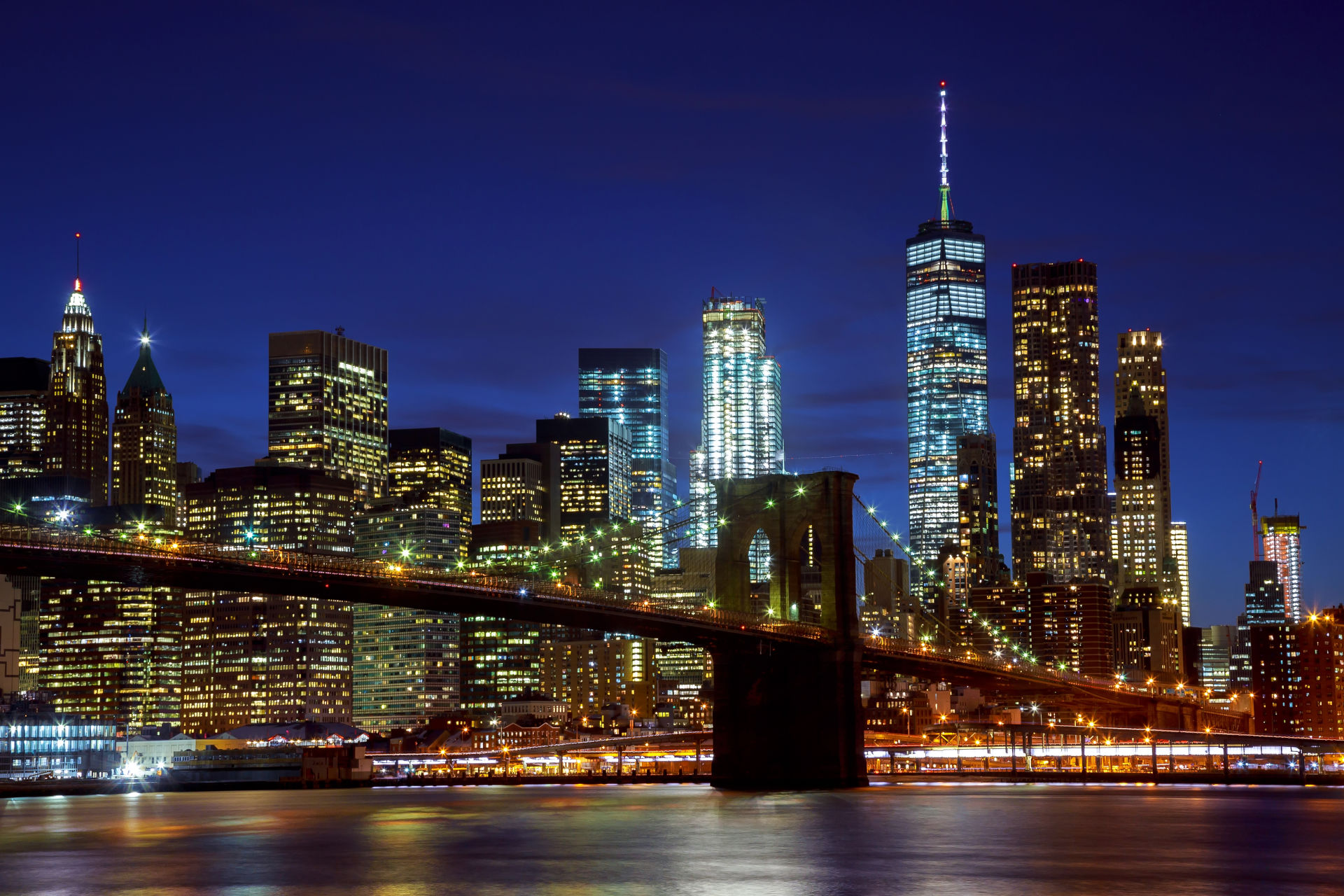 New York City Brooklyn Bridge And Manhattan Skyline At Night