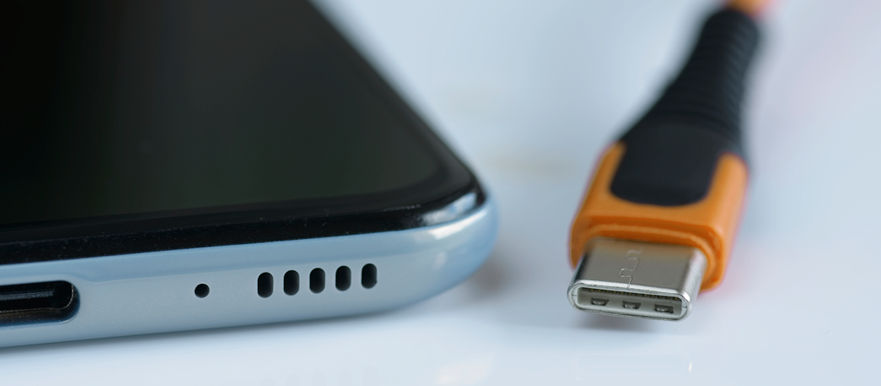 Usb C Cable Plug And Phone Charging Port Close Up
